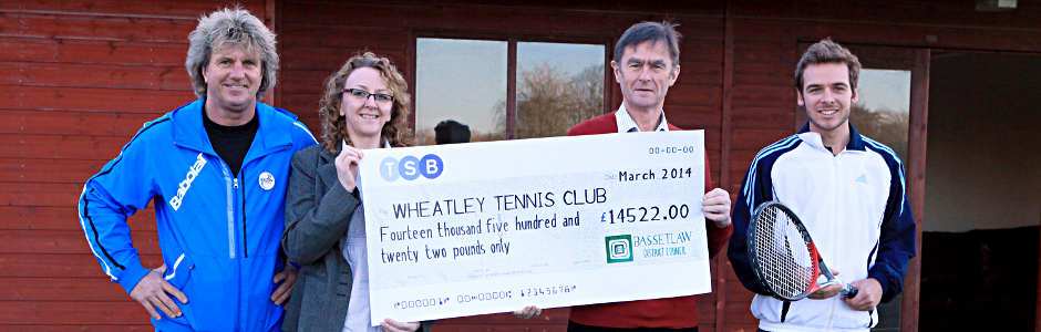 Cheque from Bassetlaw District Council being presented to Wheatley Tennis Club
